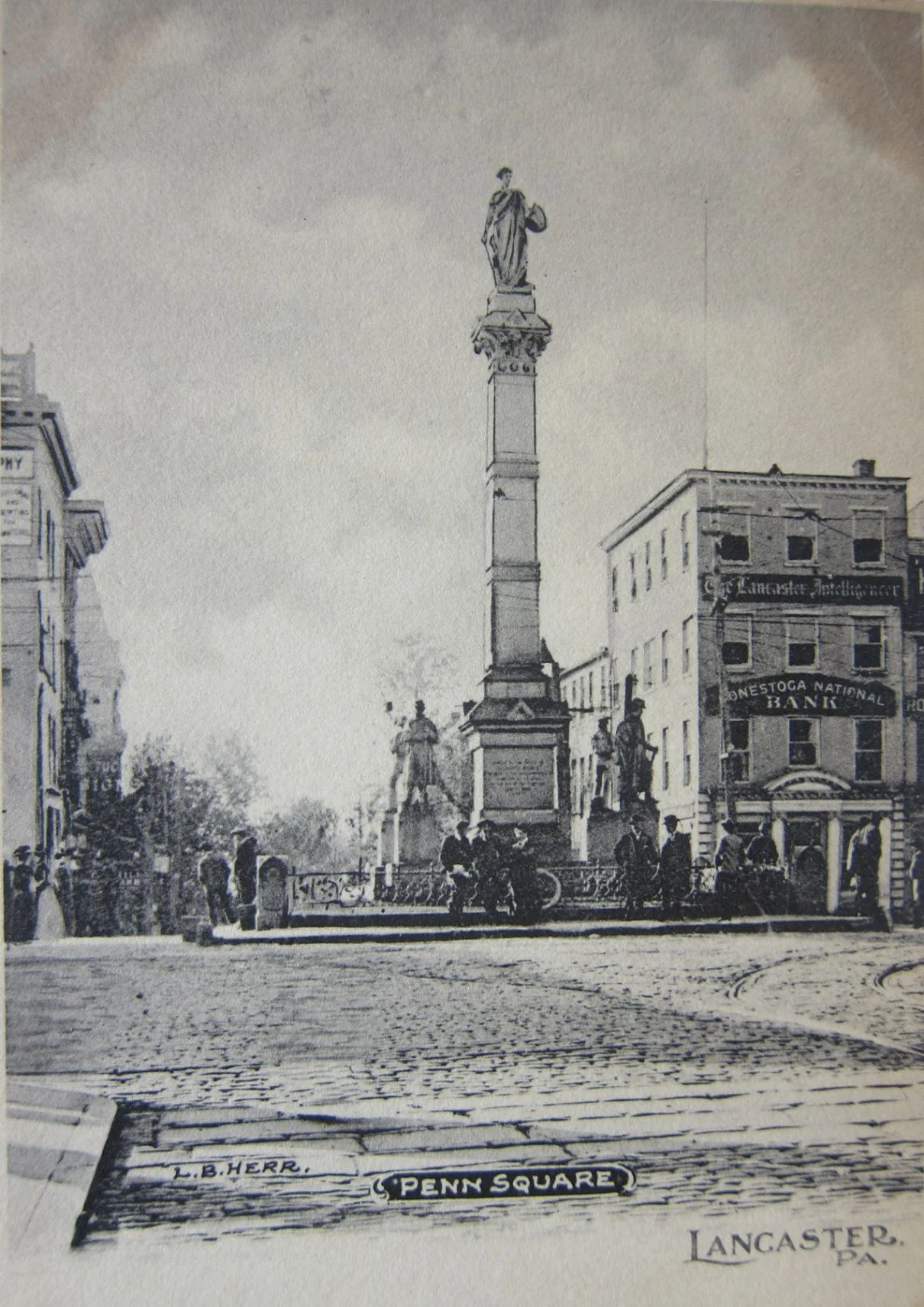 Vintage photograph of Penn Square in Lancaster Pennsylvania with monument and cobblestone street